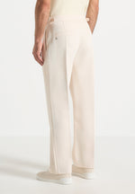 relaxed-fit-twill-pleated-tailored-trousers-cream