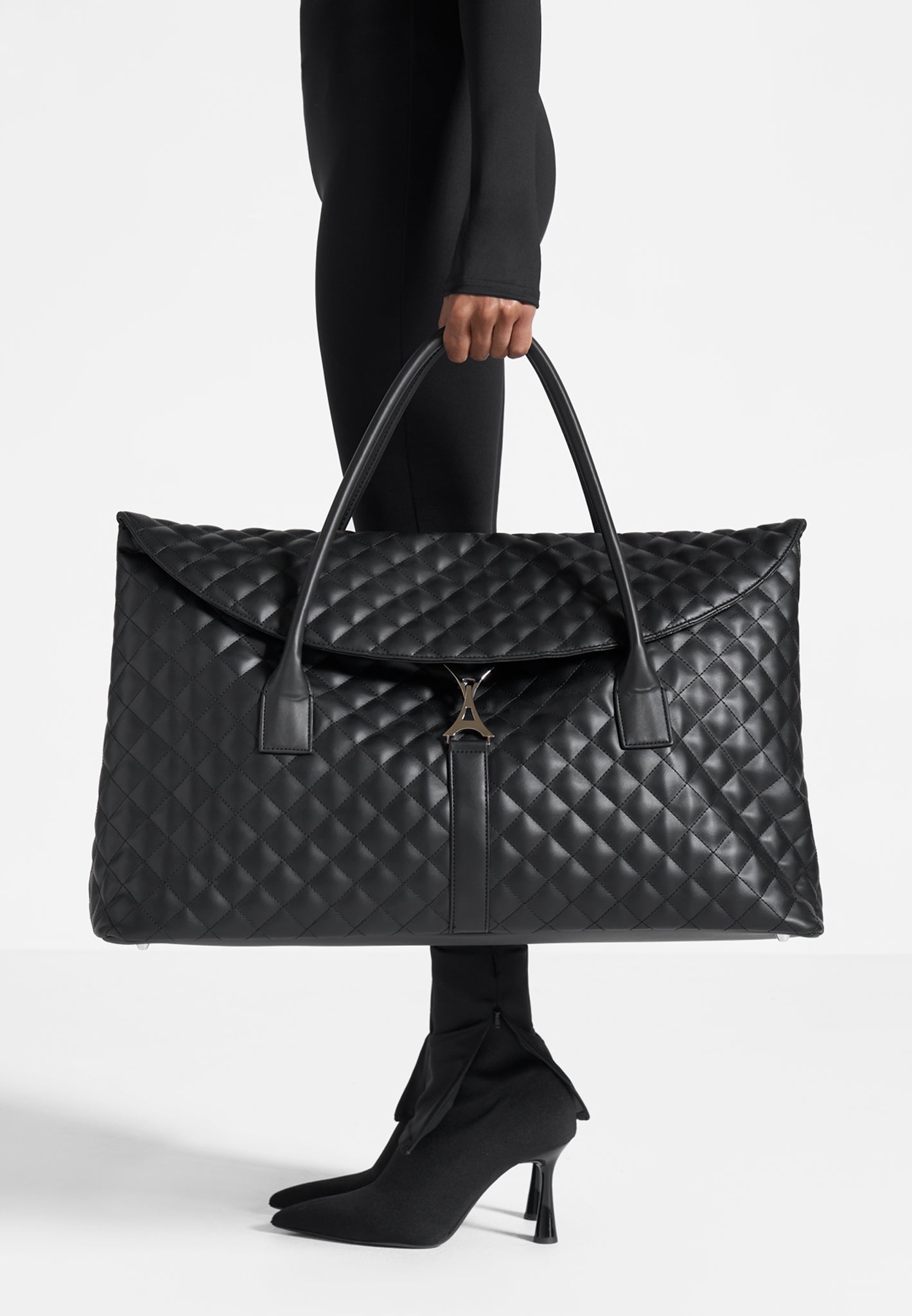black quilted travel tote bag Leather Diamond Quilted Travel Bag