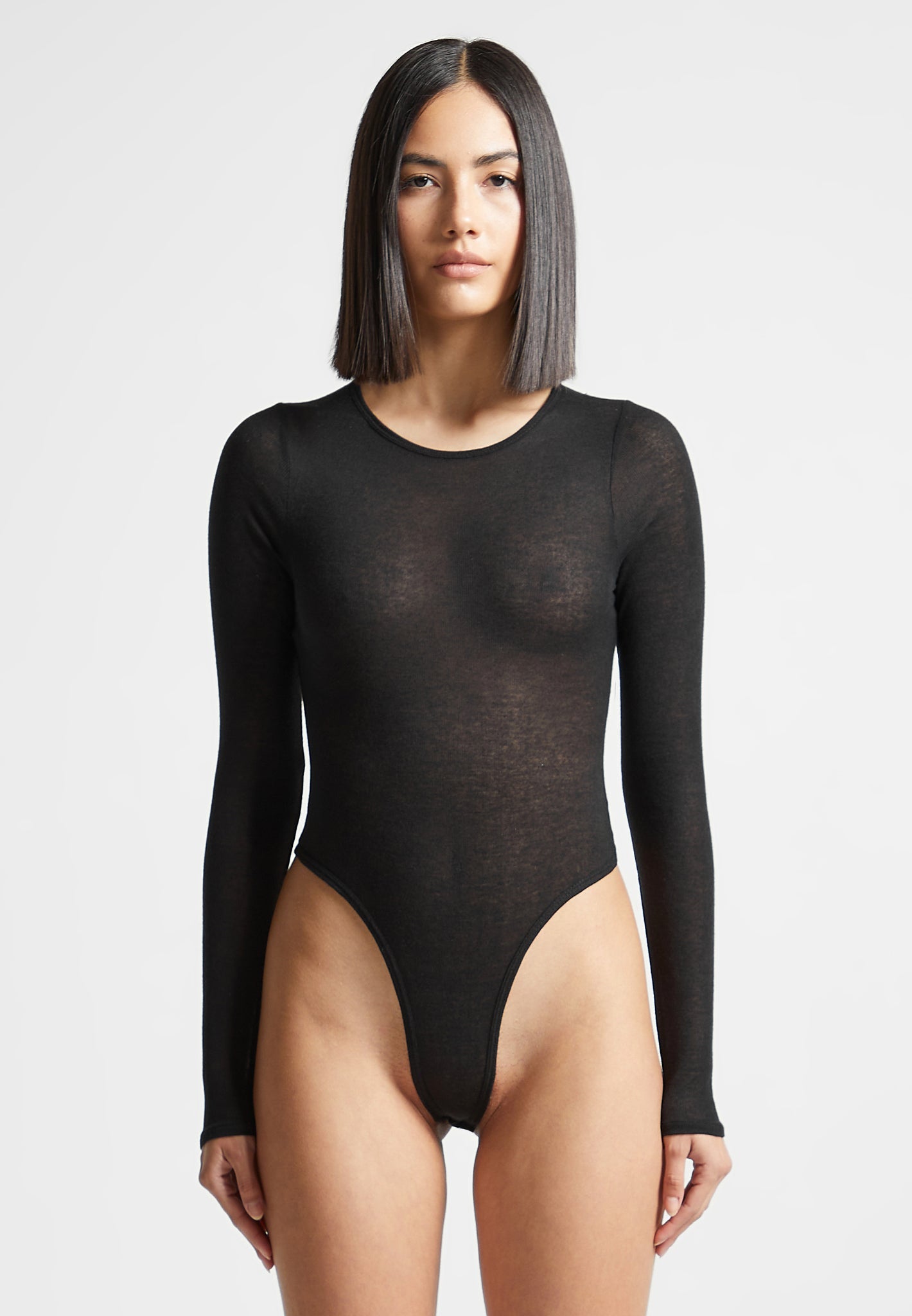 https://us.manieredevoir.com/cdn/shop/files/Eternelle-Sheer-Long-Sleeve-Bodysuit-Black6.jpg?v=1700221863