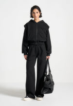 eternelle-wide-shoulder-zip-through-hoodie-black