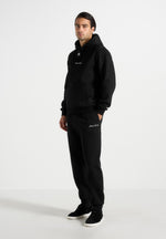 Alistair - Signature Regular Fit Cuffed Sweatpants - Black