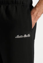 Taylor - Unisex Signature Wide Leg Sweatpants - Black