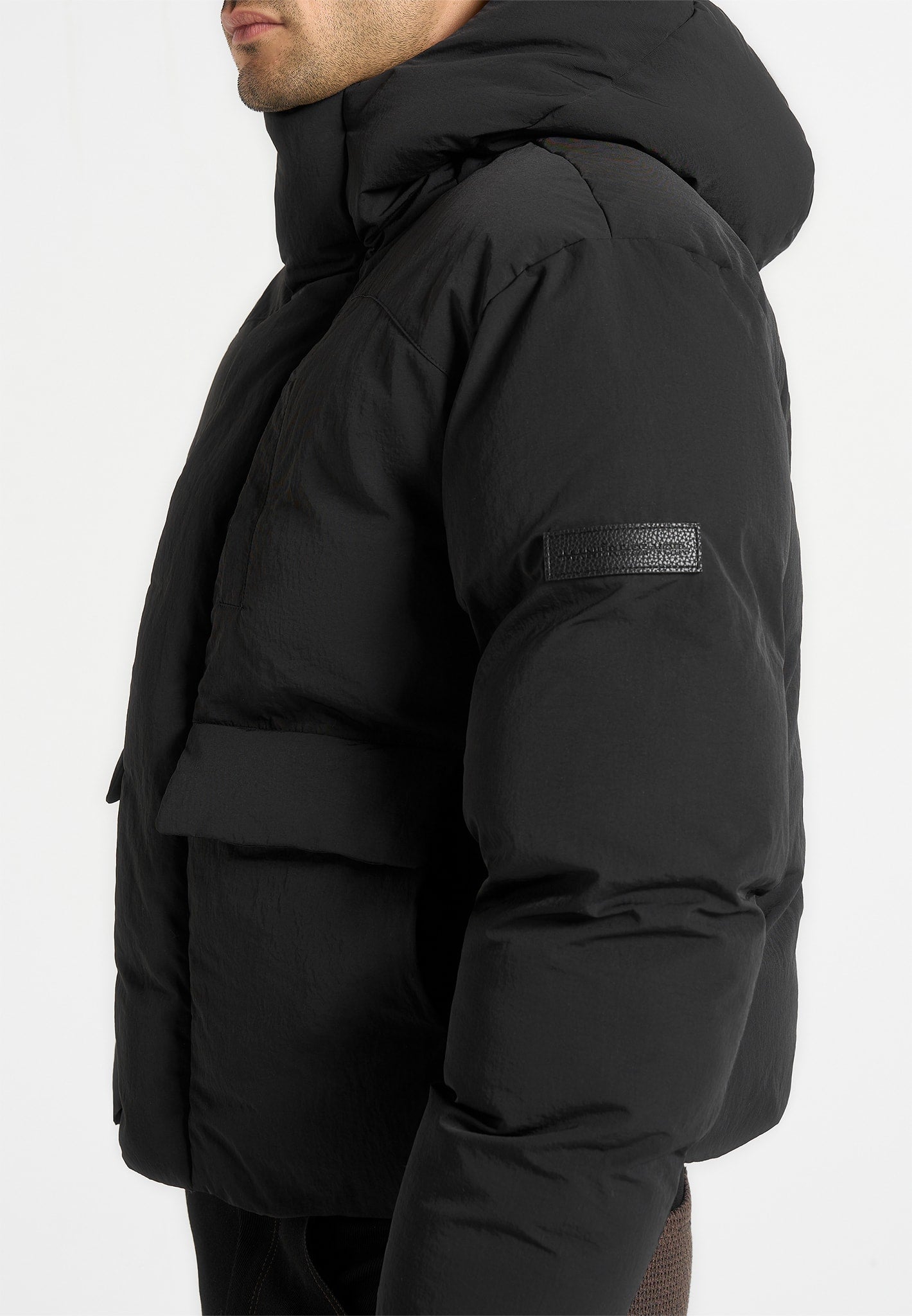 casey-unisex-minimal-raglan-puffer-jacket-black