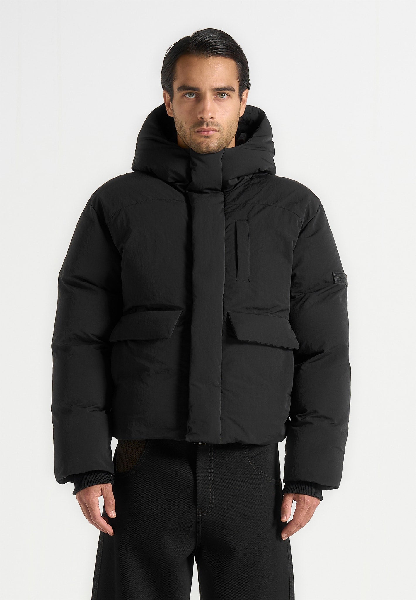 casey-unisex-minimal-raglan-puffer-jacket-black 