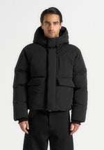 casey-unisex-minimal-raglan-puffer-jacket-black