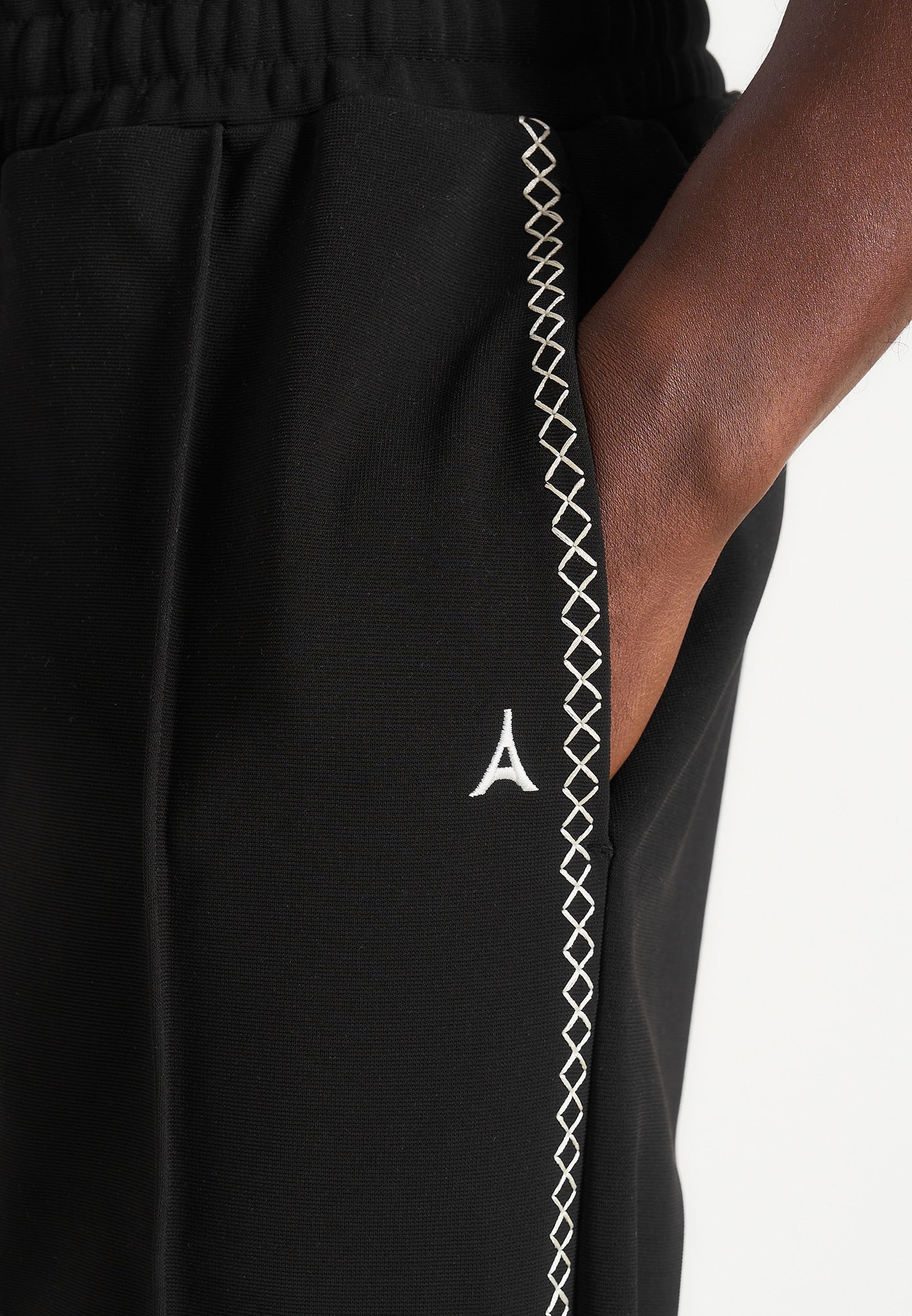 gael-contrast-whipstitch-relaxed-track-pants-black
