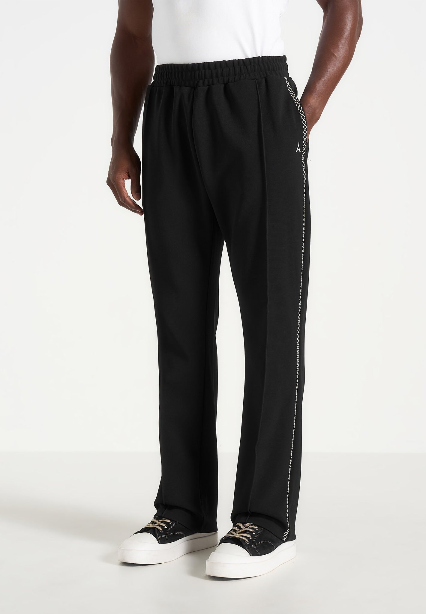 gael-contrast-whipstitch-relaxed-track-pants-black