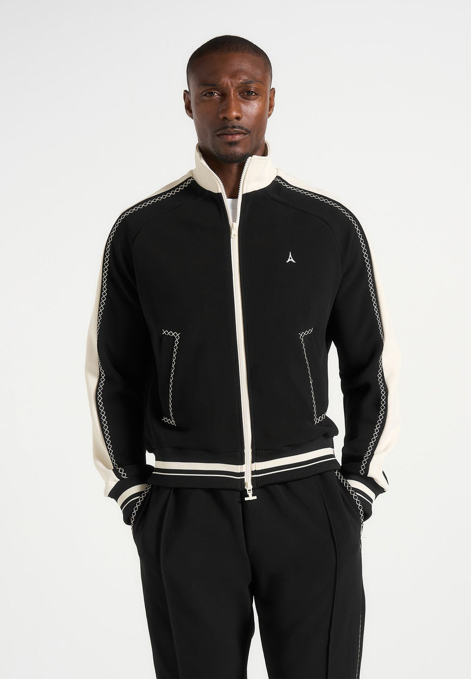 tristan-contrast-whipstitch-raglan-track-jacket-black
