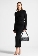 ruffle-hem-ribbed-knit-top-black