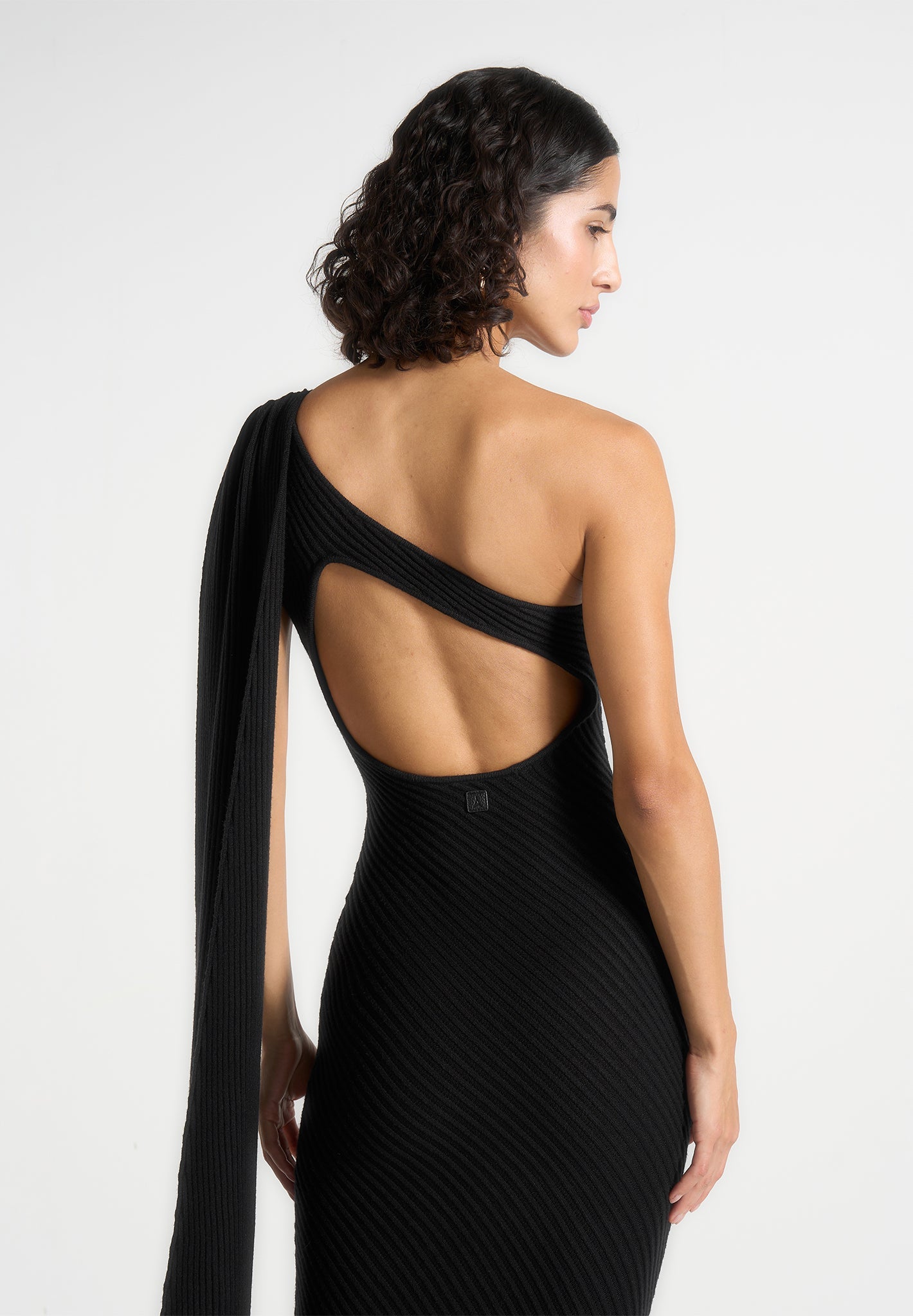 Laya - Asymmetric Knit Midaxi Dress With Scarf - Black | Manire De Voir USA Laya - Asymmetric Knit Midaxi Dress With Scarf - Black | Manire De Voir USA