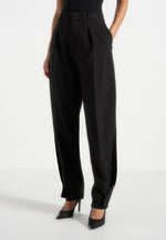 sophie-twist-leg-tailored-wool-trousers-black