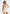christelle-cowl-halter-open-back-rosette-mini-dress-champagne