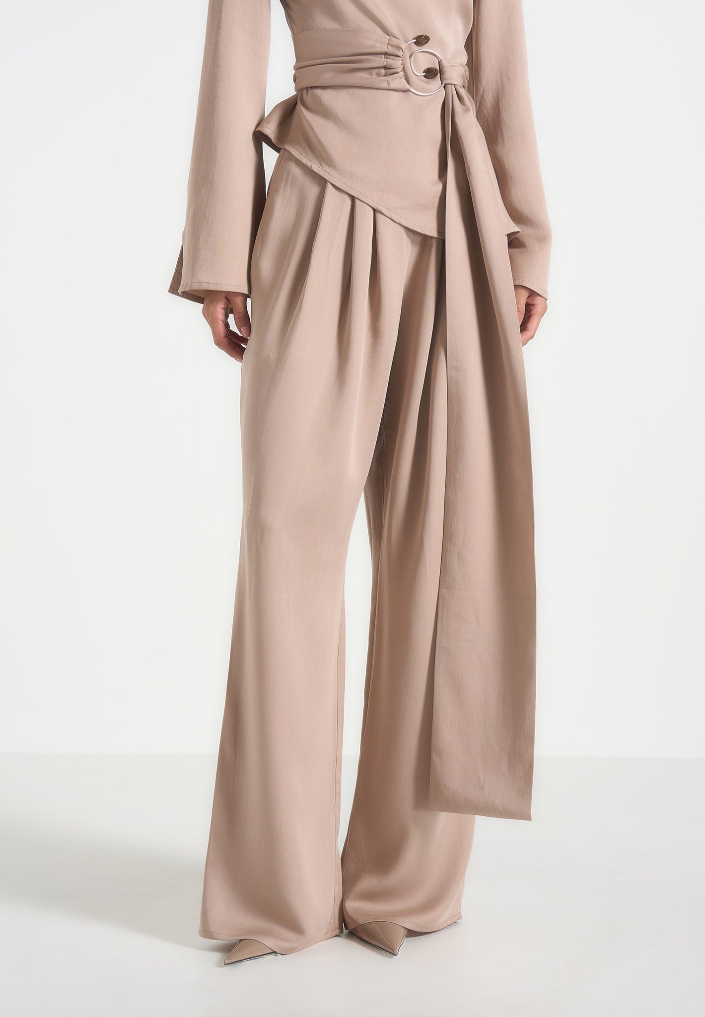 aurore-mock-neck-ring-belt-pleated-leg-jumpsuit-beige 