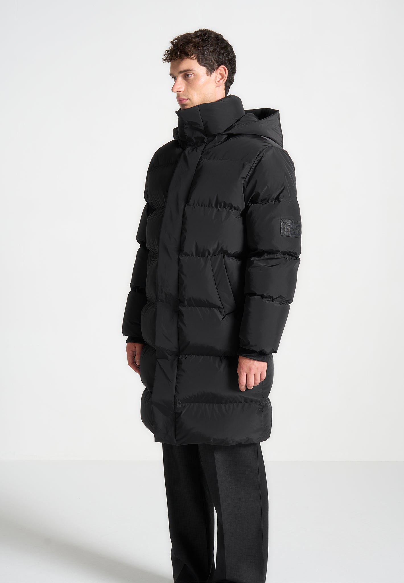 longline-quilted-puffer-jacket-black