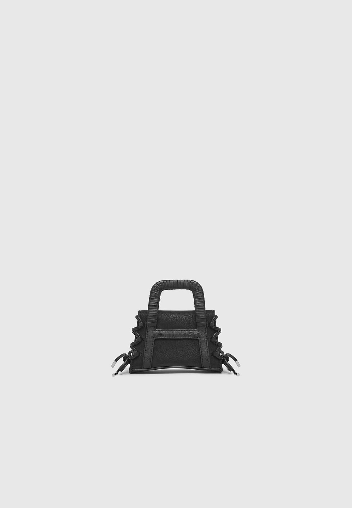 miniature-caged-vegan-leather-lace-up-bag-black