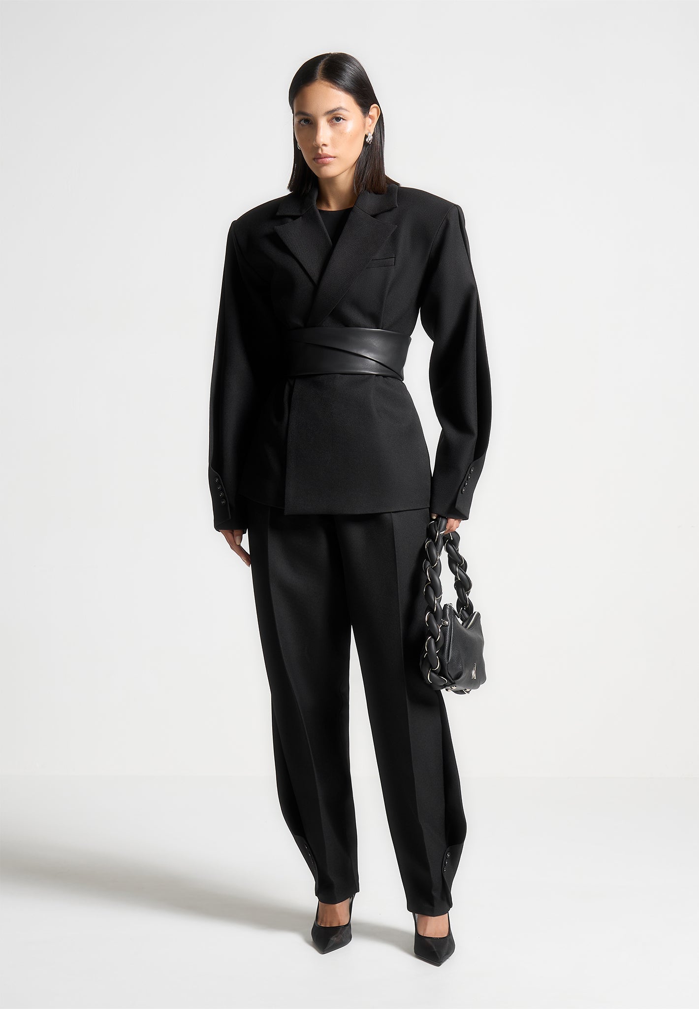 twist-leg-tailored-trousers-black